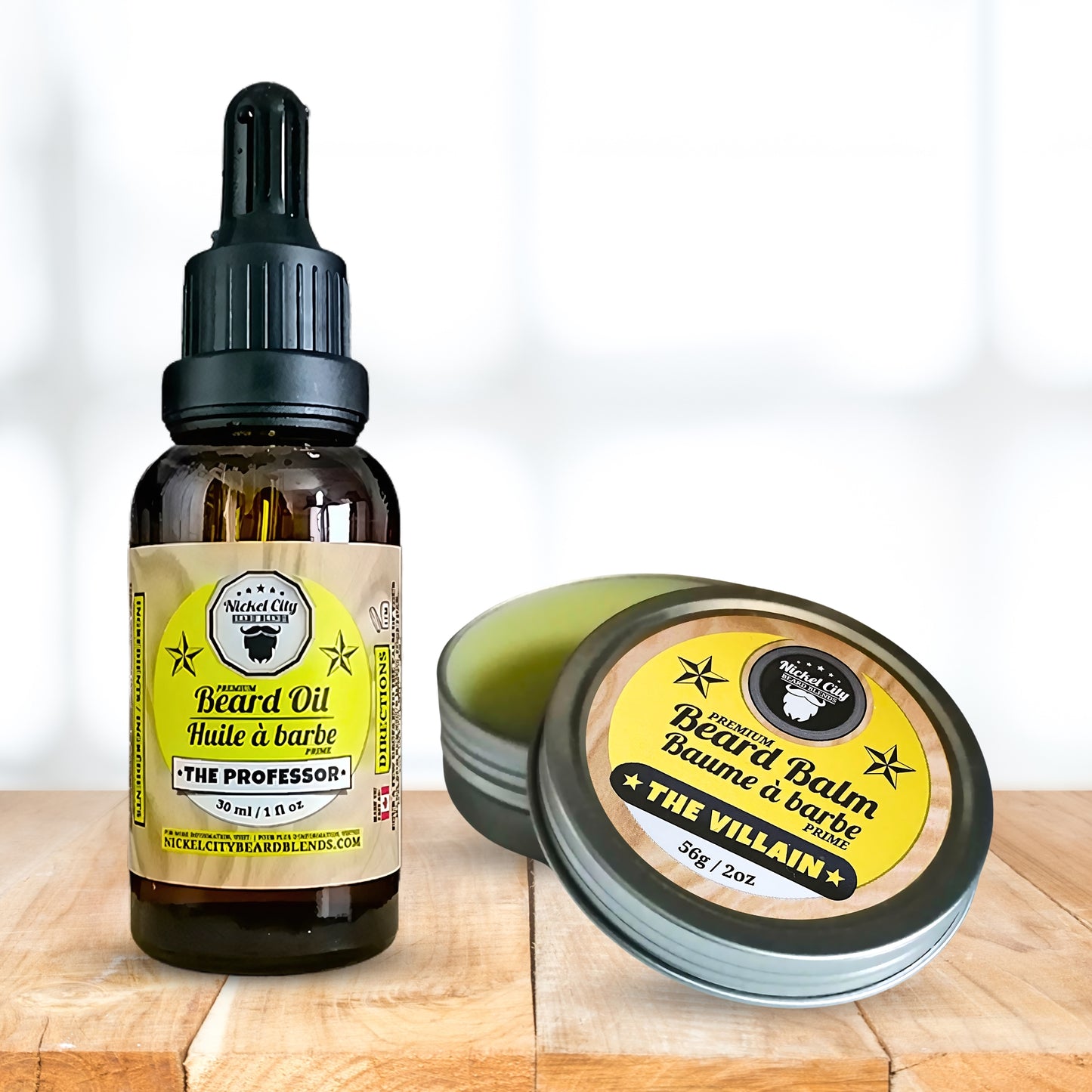 Bottle of beard oil and jar of beard balm on a wooden surface with a white background