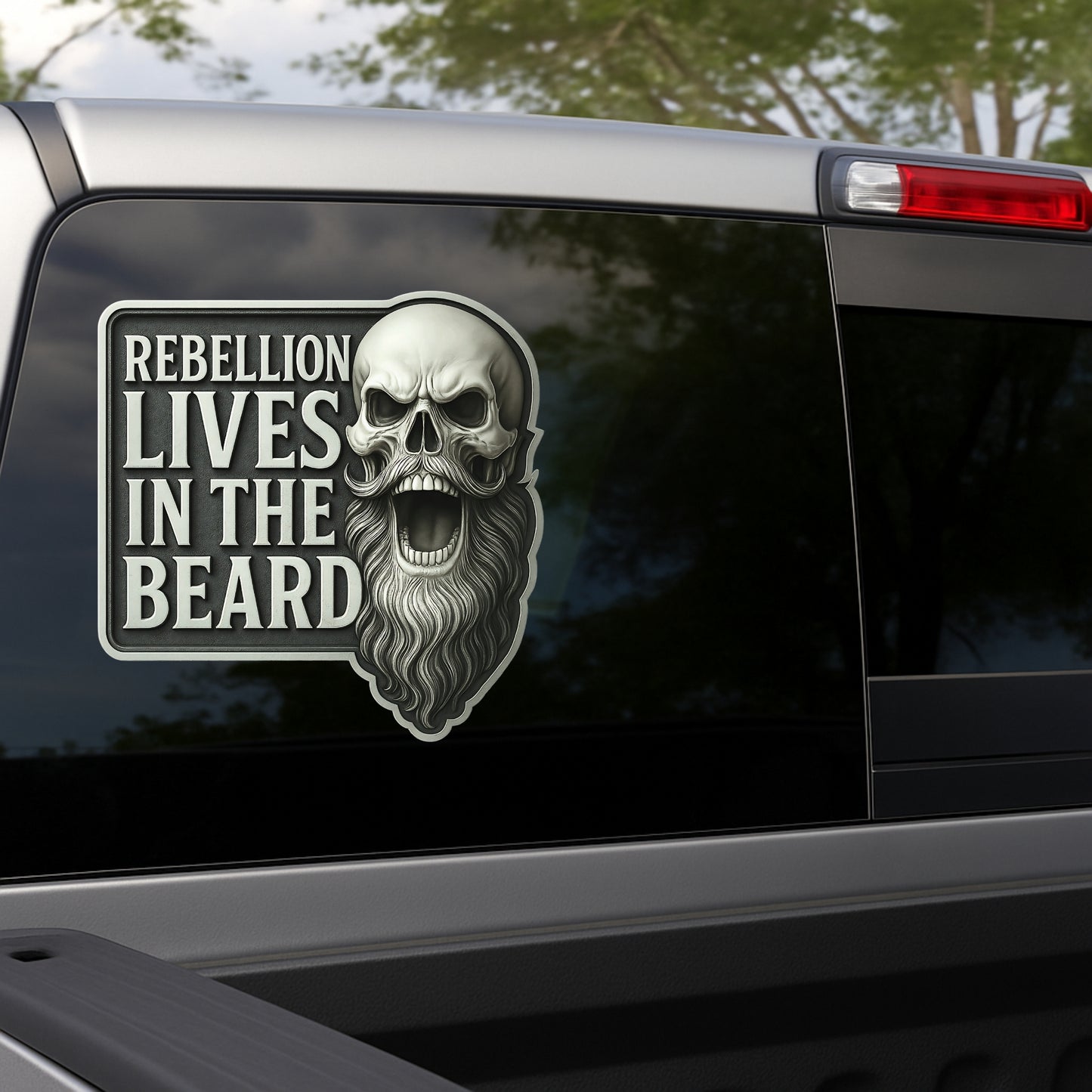 Skull with beard and 'Rebellion Lives in the Beard' text on a car window
