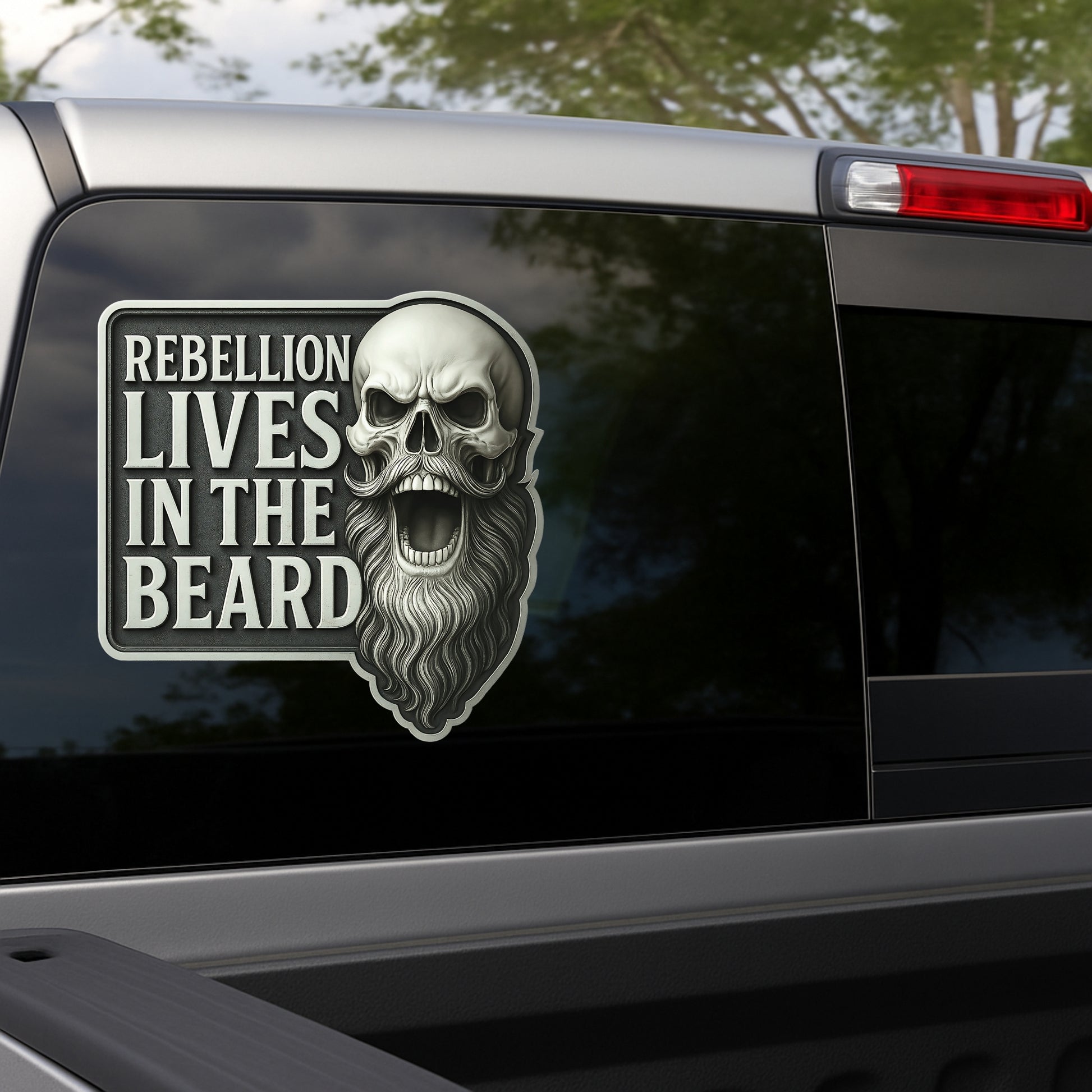 Skull with beard and 'Rebellion Lives in the Beard' text on a car window