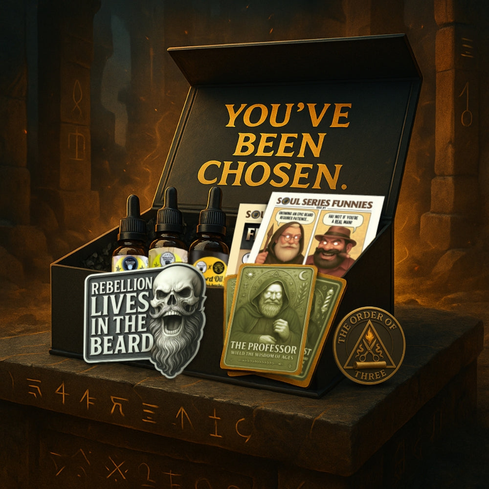 Box with various items including bottles, cards, and a patch on a dark background