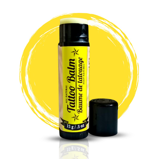Tattoo balm with yellow label and black cap on a white background