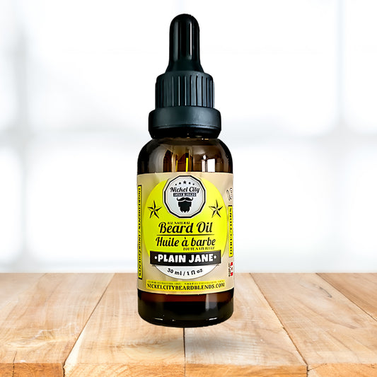 Bottle of beard oil with a label on a wooden surface