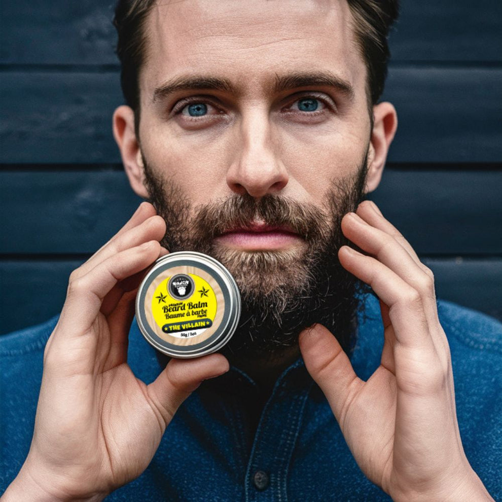 Man holding The Villain beard balm 