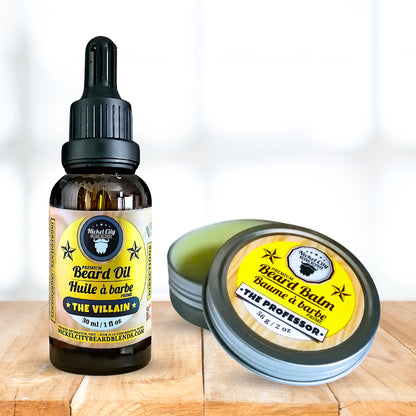 Bottle of beard oil and jar of balm on a wooden surface with a white background