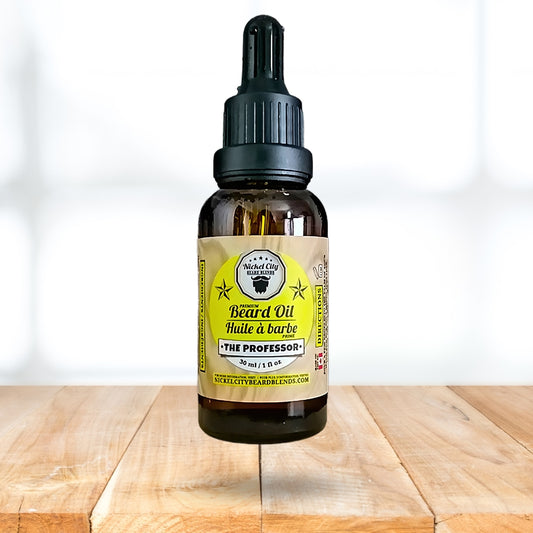 Bottle of beard oil with a yellow label on a wooden surface