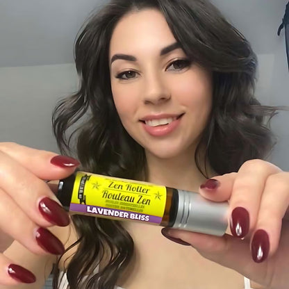 Brunette woman holding essential oil roll on from Nickel City Beard Blends