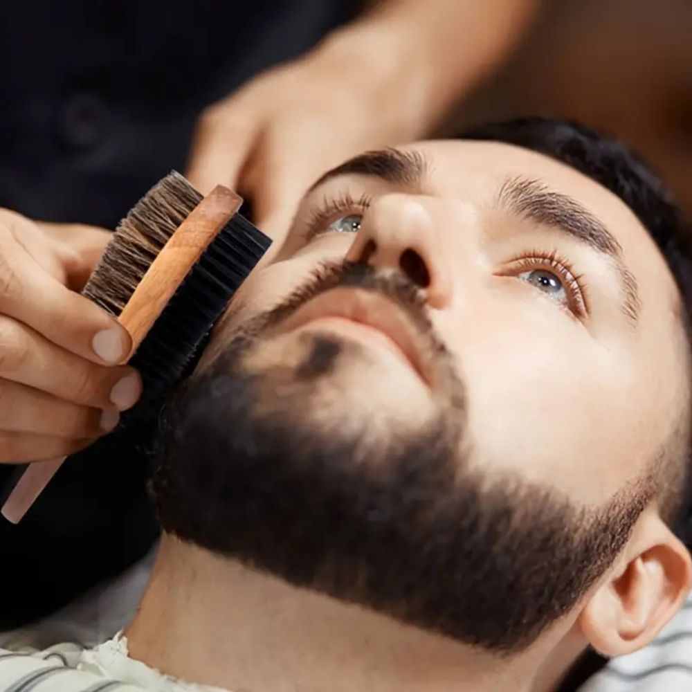 Barber Brushing Man's Beard